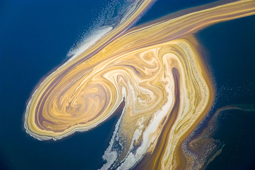 Floating algae drifting on the surface of Lake Natron, Tanzania